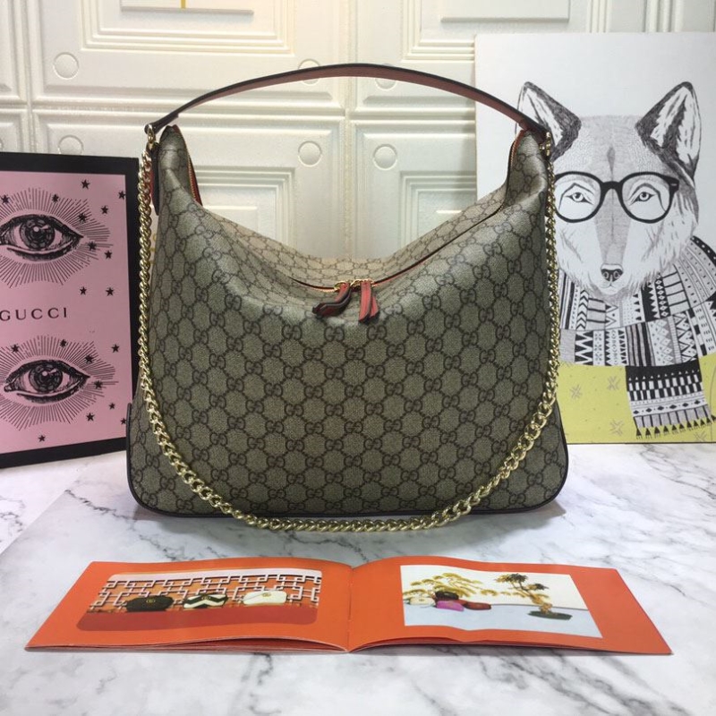 G*u*i top handle bags